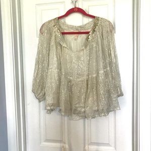 Very pretty, flowy Anthropologie (Raga) top. Sparkly silver and gold. Tassles.
